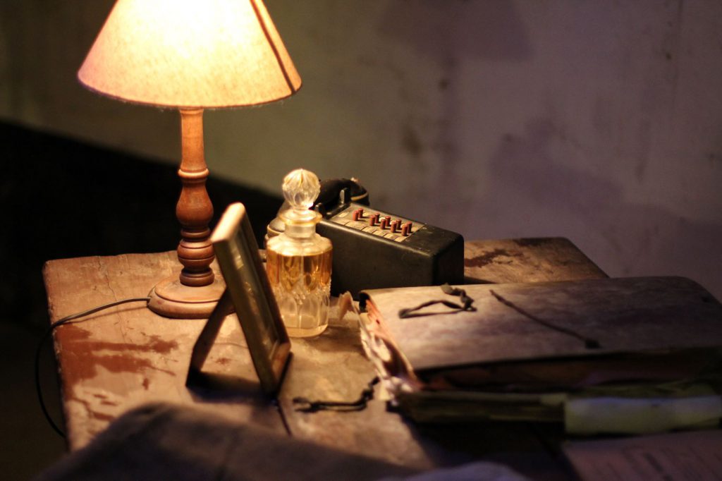 Black Book Beside Table Lamp