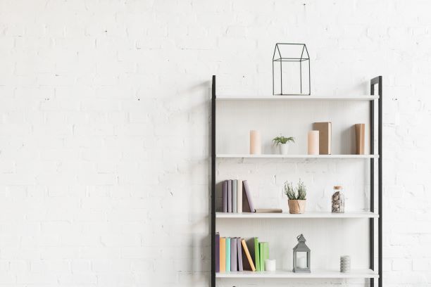 books-show-plant-candles-shelves-living-room
