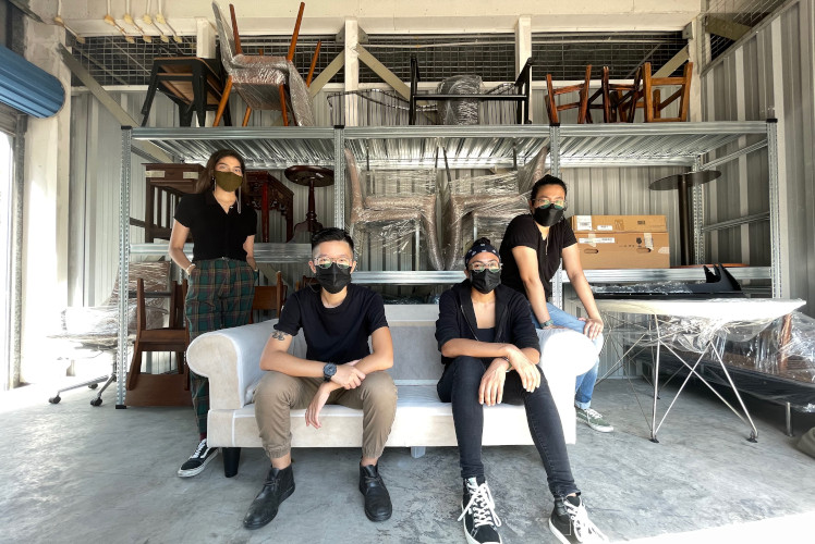 Pangdemonium crew in a drive-through storage unit at StorHub facility in Changi